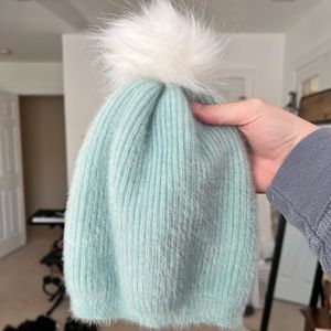 light blue winter beanie with pom pom